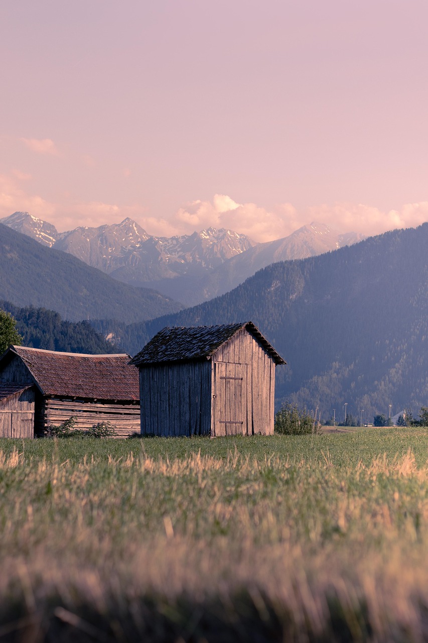 shack cottage hut meadow pasture field mountains nature