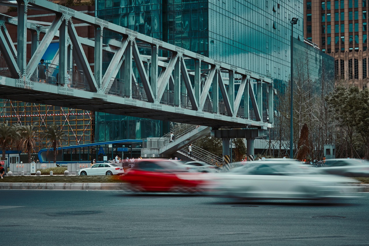 city  road  traffic  footbridge  cars  vehicles  speed  fast  pedestrian bridge  pedestrian overpass  street  urban  buildings  traffic  cars  speed  speed  speed  fast  fast  fast  fast  fast  street