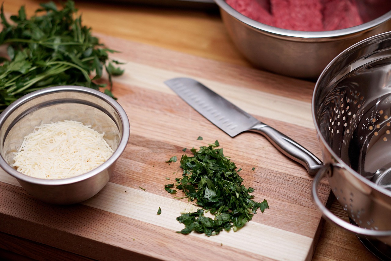 kitchen cooking knife cilantro mixing bowl strainer bowl strainer kitchenware parmesan shredded cheese shredded parmesan cutting board wood cutting board kitchen kitchen kitchen kitchen cooking cooking cooking cooking cooking knife cutting board