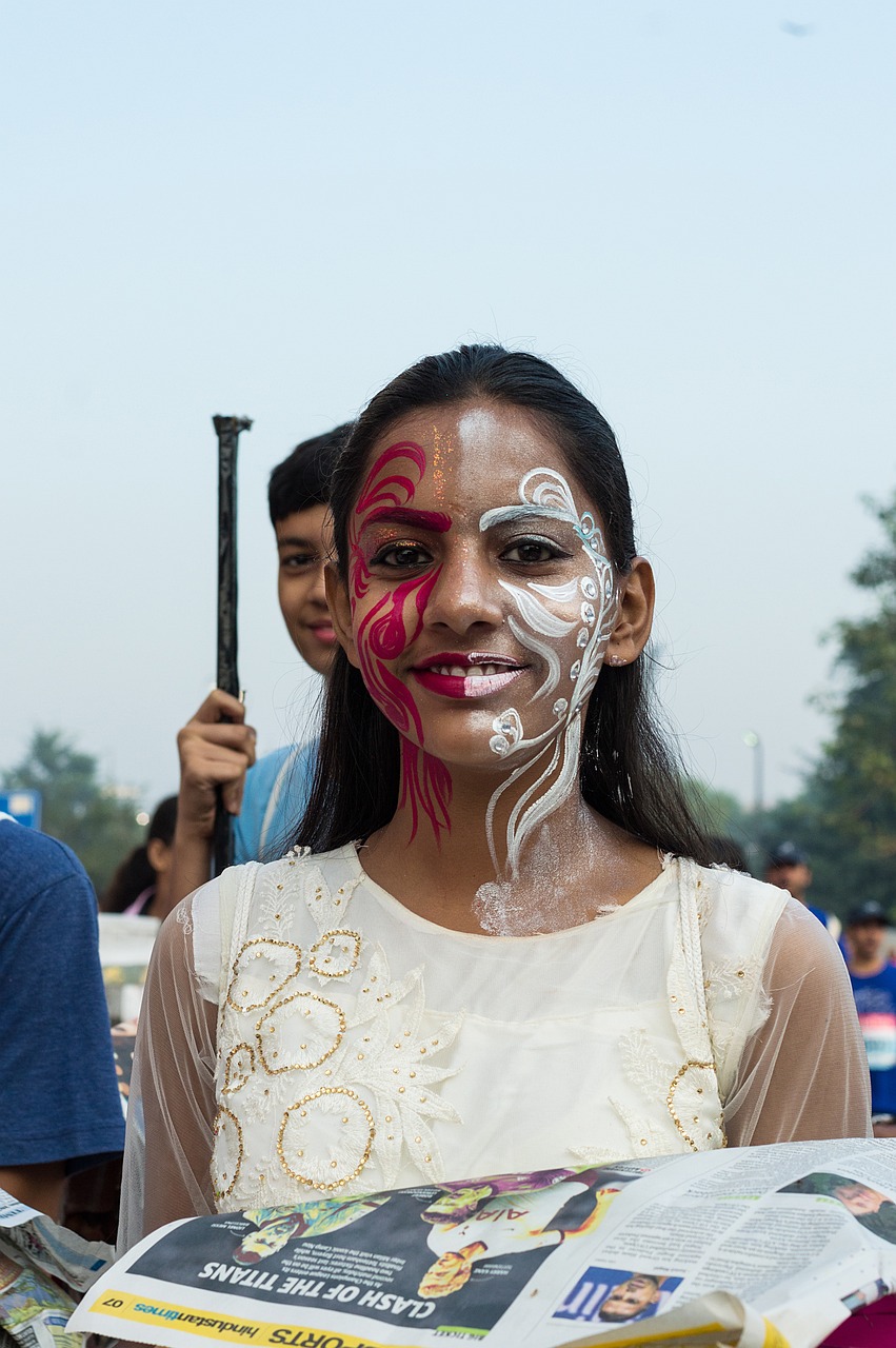 female young girl fashion colored face outdoor paint for cause portrait model blue painting blue paint