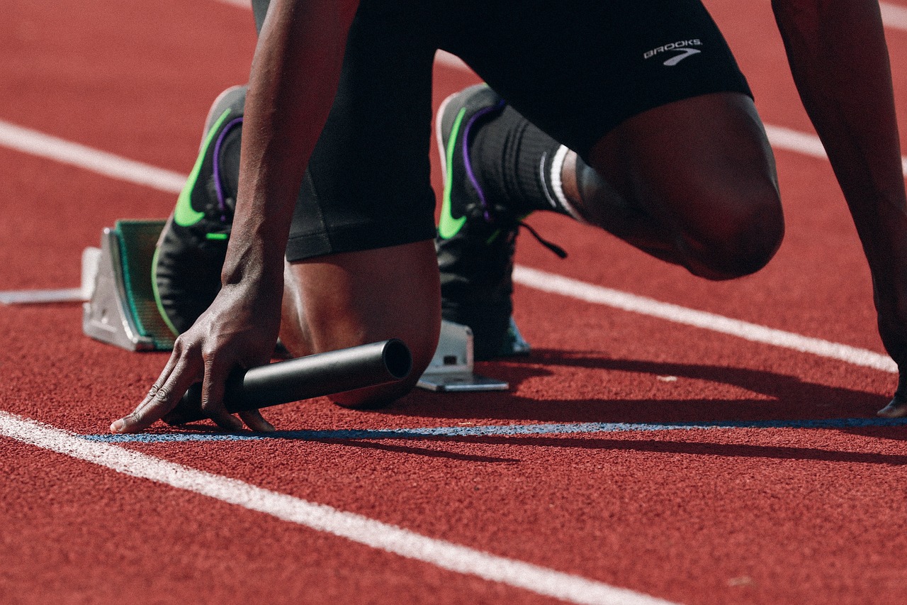 athlete runner sprint fast black man black man person racetrack relay sport sports wear start athlete runner sport sport start start start start start