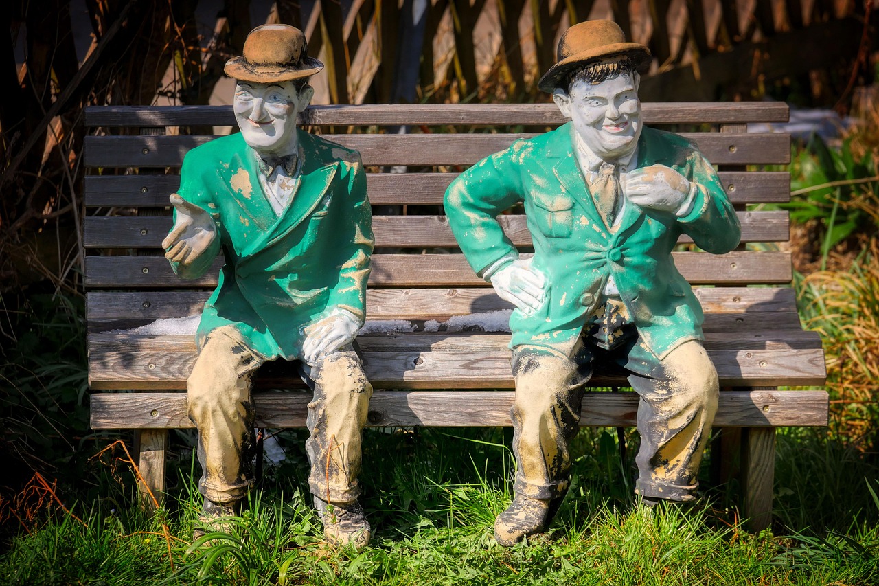 laurel and hardy statues laurel and hardy sculptures park garden bench art sculptures nature comedians