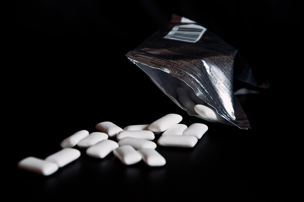 chewing gum  table  scattered  packaging  silver  black background  glittering  chewing gum  chewing gum  chewing gum  chewing gum  chewing gum