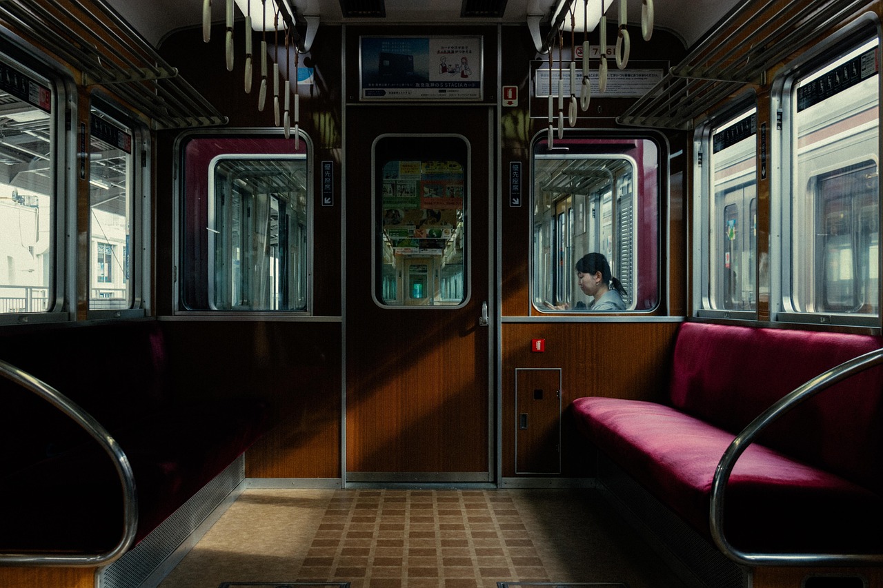 woman train kyoto japan people transportation work routine waiting daylight morning japancontest