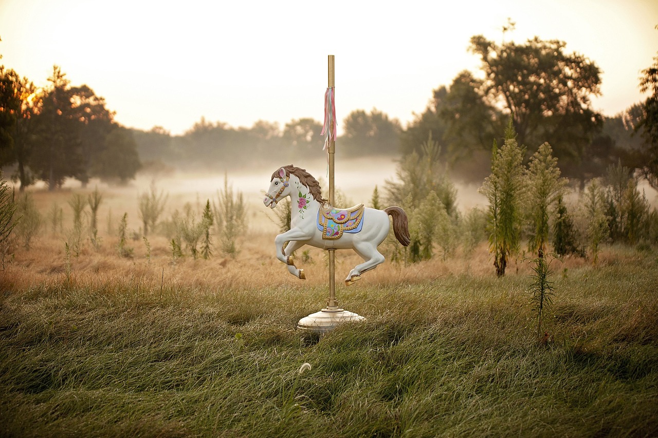 horse carousel ride hd wallpaper childhoood nature carousel horse fair fog field 4k wallpaper